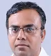 Dr. Kiran M