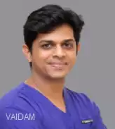 Dr. Suman M B