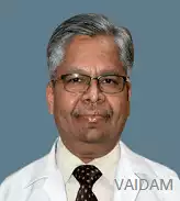 Dr. Sadanand Karandikarq